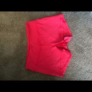 Bright pink booty shorts